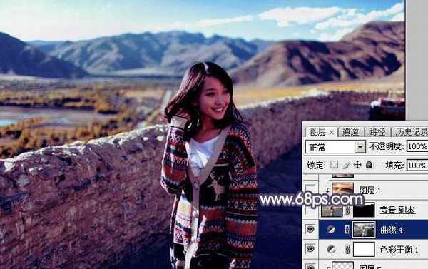 Photoshop将高原山区人物图片调至出灿烂的霞光色